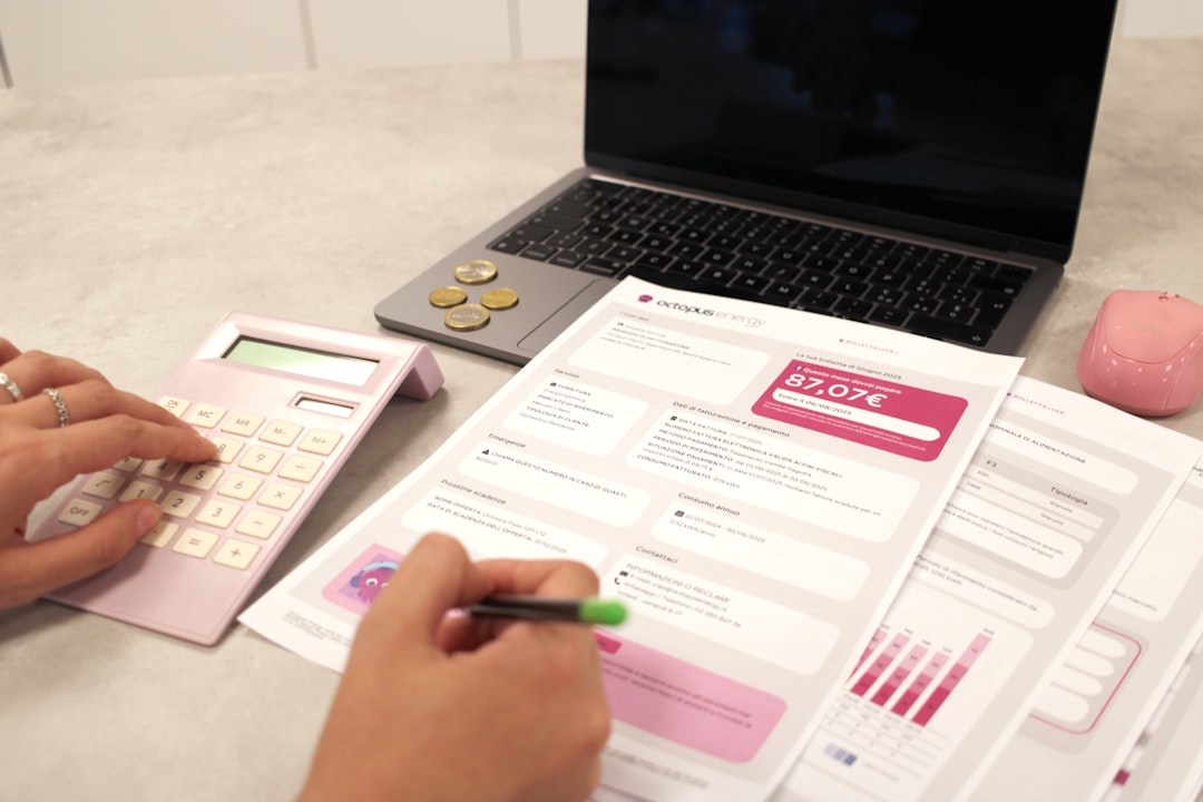 marketing budget planning spreadsheet - Someone is calculating their finances with documents.